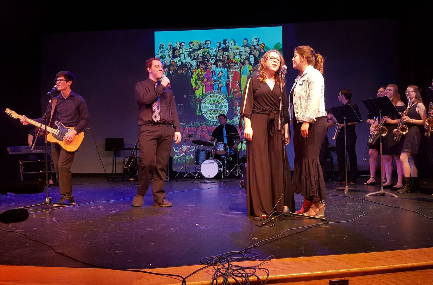 Students performing on stage
