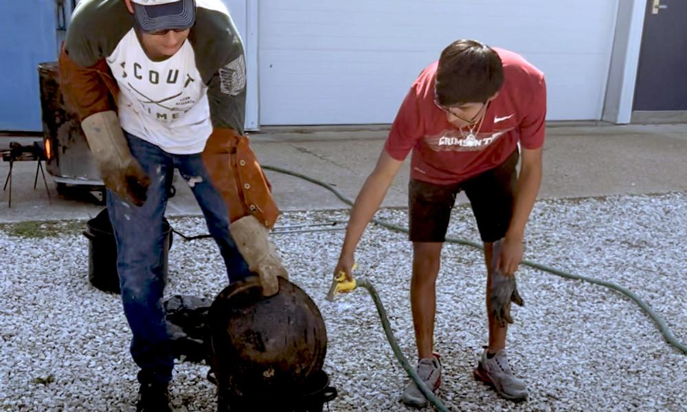 Students firing Raku pottery