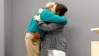 Gazi Rahman and Cyndi Boyce hug at LTC's Faculty and Staff Recognition Banquet