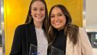 Krista Phillips (left) and Madisyn McIntosh (right) celebrate by holding their 6th place trophies at the FBLA Collegiate National Leadership Conference