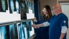 Radiography students looking at Xrays